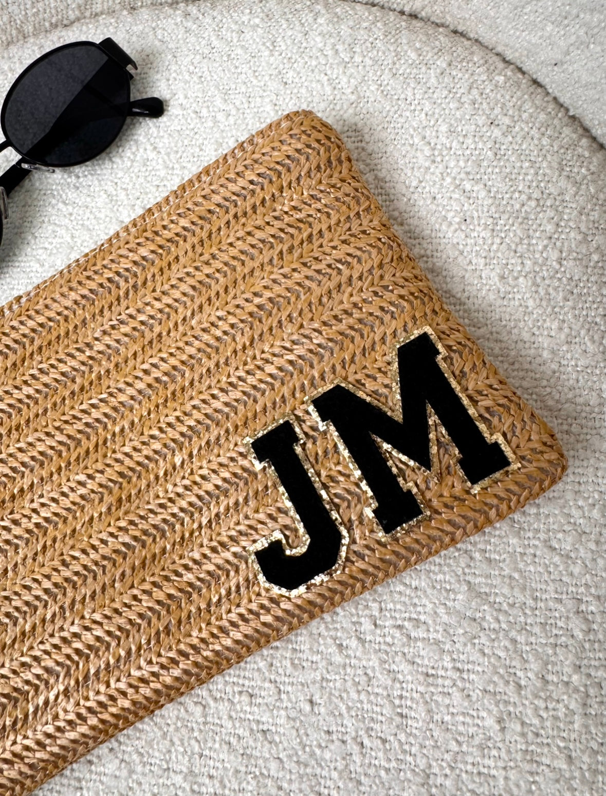 tan personalised beach clutch with black teddy glitter initials