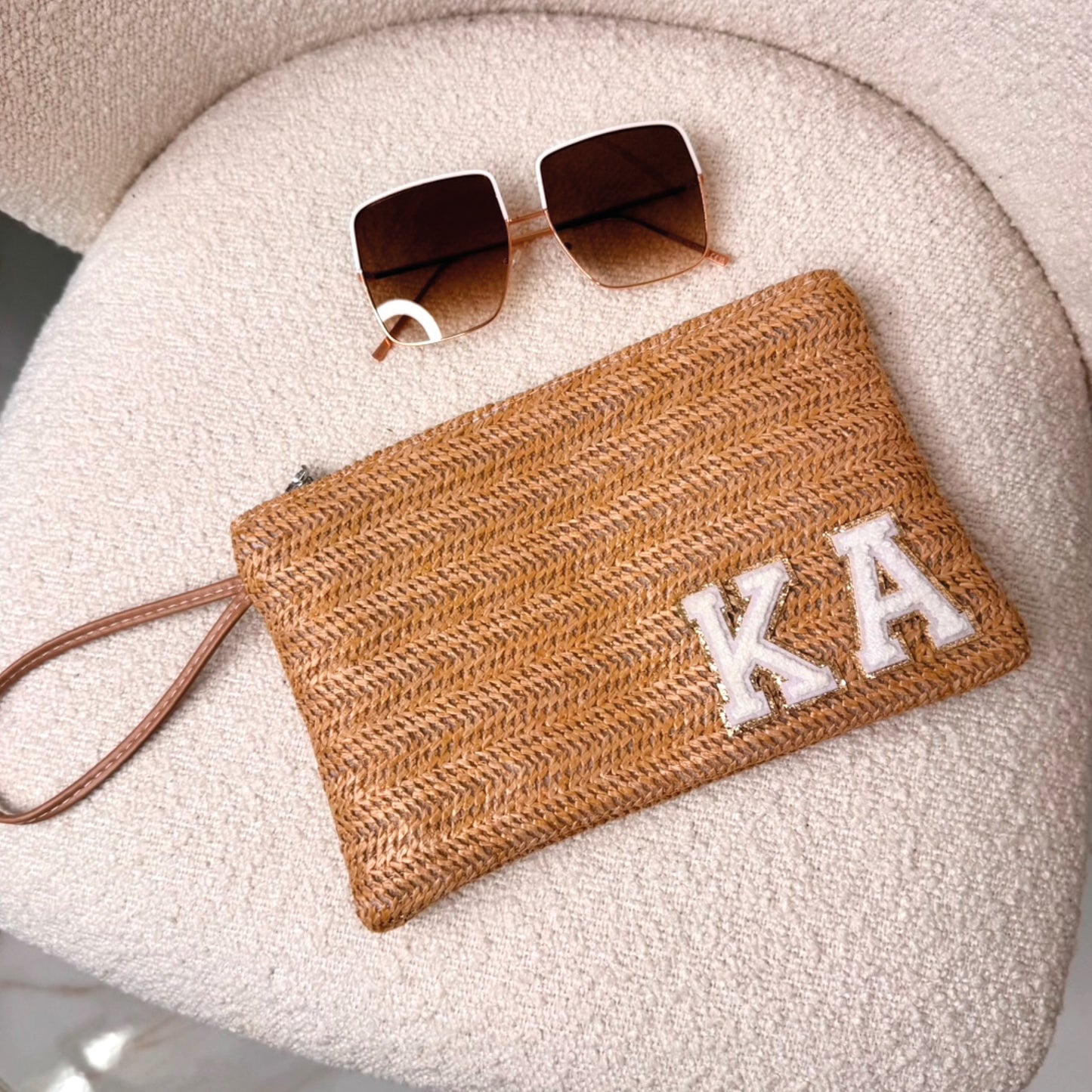 tan personalised beach clutch with white teddy glitter initials