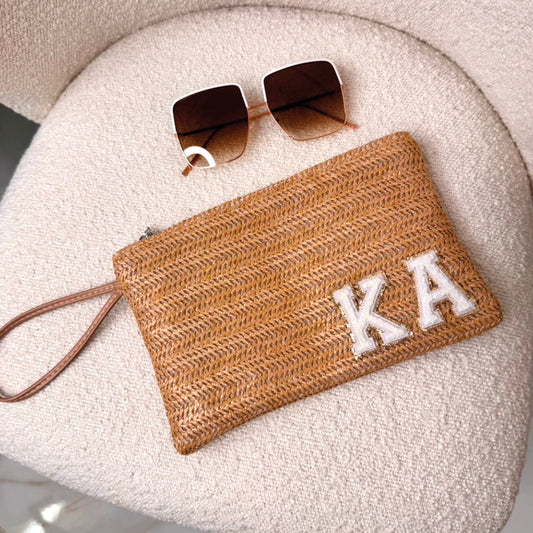 tan personalised beach clutch with white teddy glitter initials