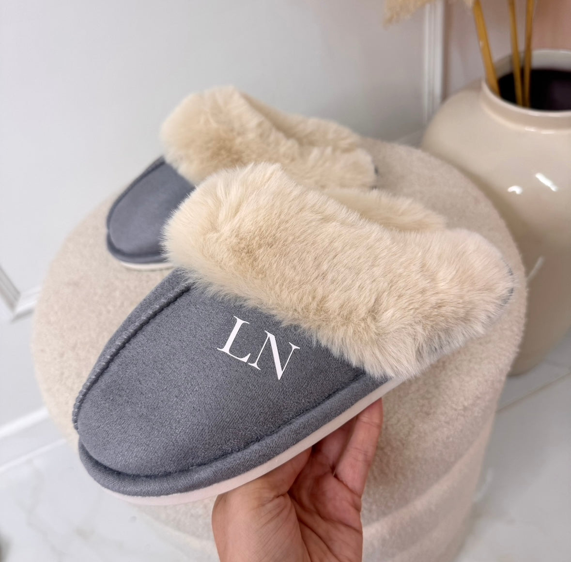 grey fluffy mule slippers with white initials