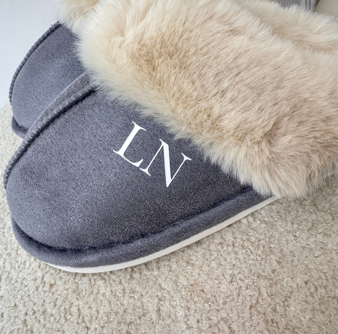 grey fluffy mule slippers with white initials