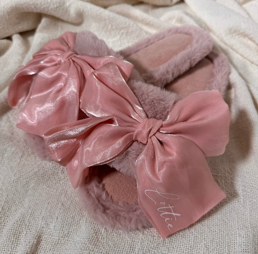 pink fluffy bow slippers with white name