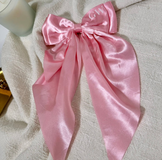 pink long satin bow with white initials