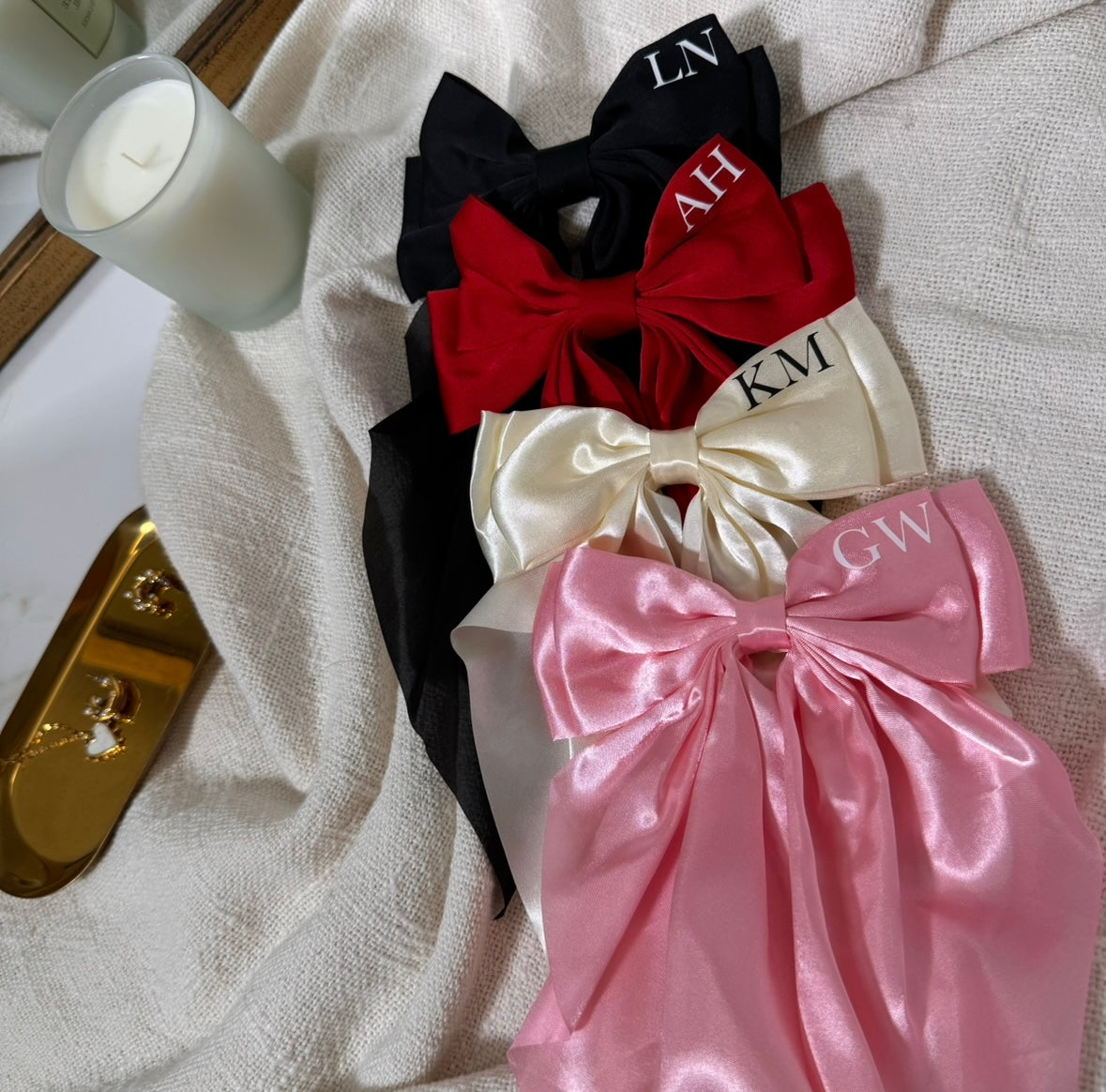 pink long satin bow with white initials