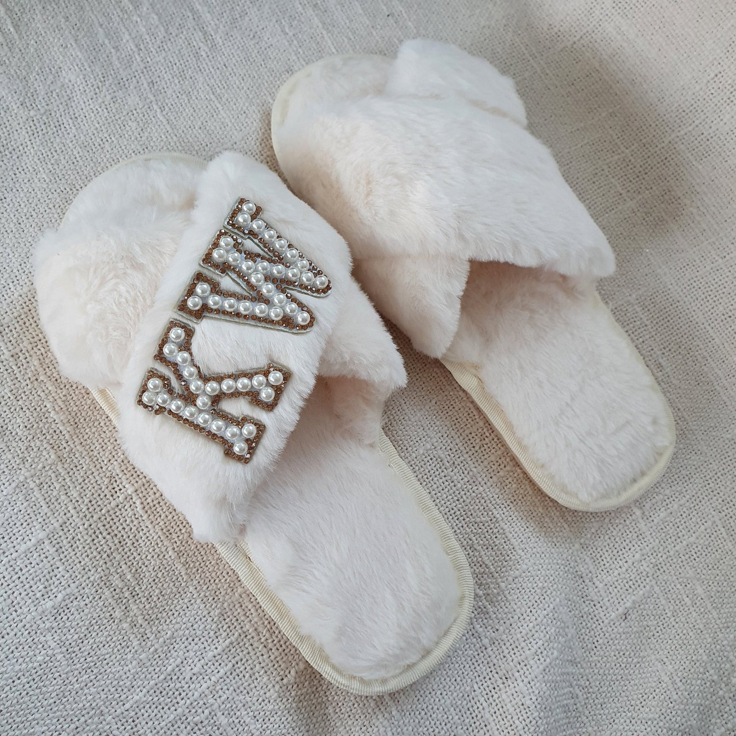 DOUBLE INITIAL cream fluffy slippers with gold diamante