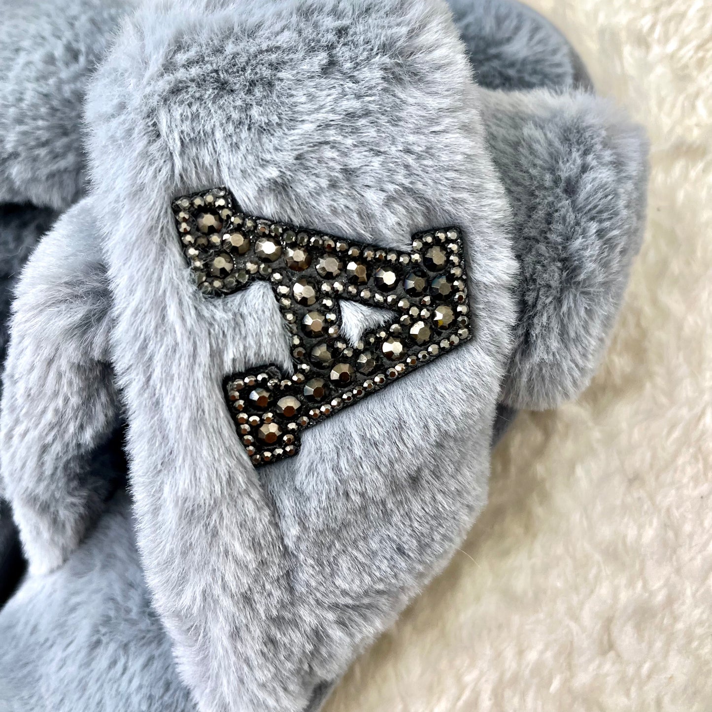 SINGLE INITIAL grey fluffy slippers with black diamante